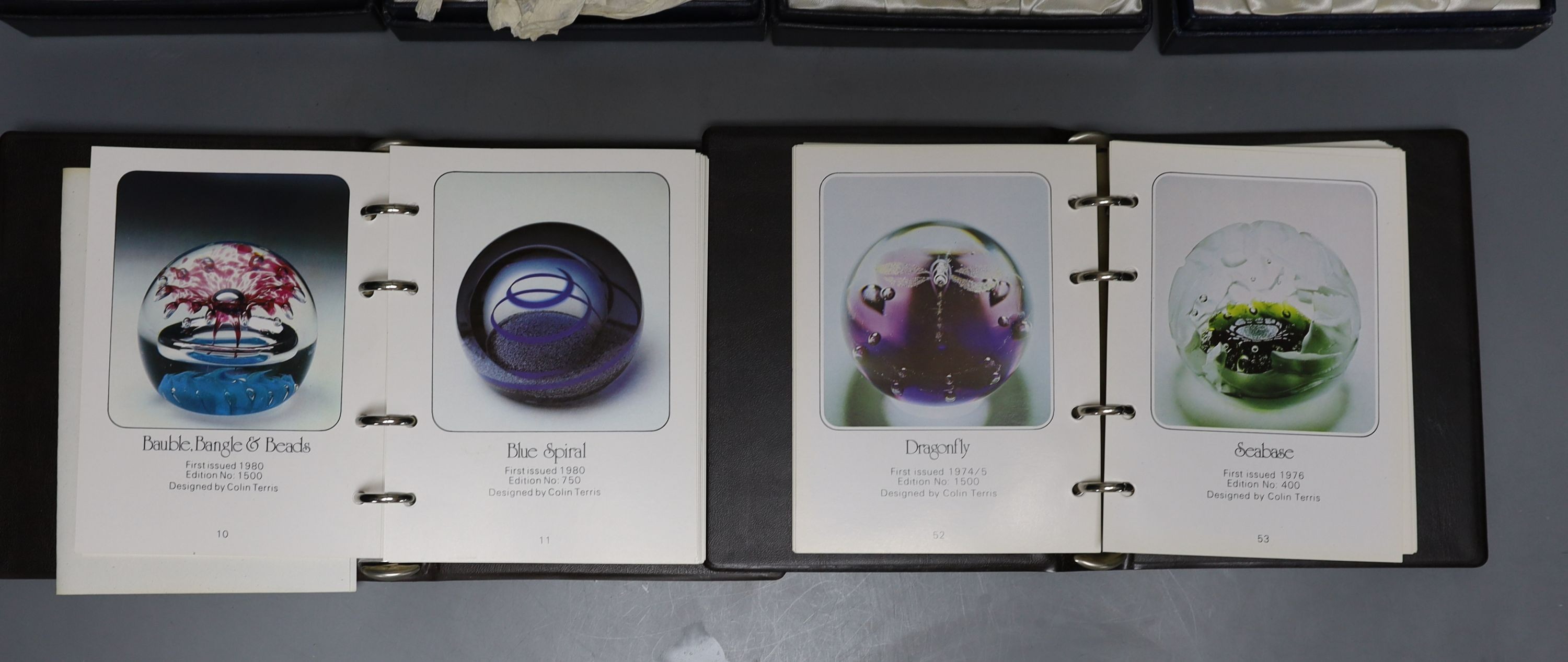 Four cased Caithness glass paperweights